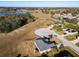 Community view showcasing a lake and neighborhood at 1218 Coda Ct, Dundee, FL 33838