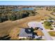 House, lake, and community view from above at 1218 Coda Ct, Dundee, FL 33838
