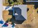Aerial view of house, driveway, and yard at 1218 Coda Ct, Dundee, FL 33838
