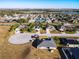 Neighborhood view showing various homes and landscape at 1218 Coda Ct, Dundee, FL 33838