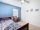Small bedroom with a twin bed and closet at 1218 Coda Ct, Dundee, FL 33838