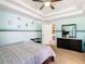 Main bedroom with a double bed, dresser and ceiling fan at 1218 Coda Ct, Dundee, FL 33838