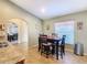 Small dining area with table and chairs, near kitchen at 1218 Coda Ct, Dundee, FL 33838