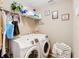 Convenient laundry room with washer and dryer at 1218 Coda Ct, Dundee, FL 33838