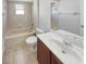 Clean bathroom with tub, toilet and vanity at 1778 Oak Grove Chase Dr, Orlando, FL 32820