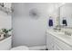 Clean bathroom with white cabinets and a stylish mirror at 2009 Appian Ct, Deltona, FL 32725