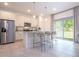 Modern kitchen with stainless steel appliances and granite countertops at 29 Hemlock Pass, Ocala, FL 34472