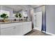Bathroom with double vanity and walk-in shower at 2952 Waterlily Way, Poinciana, FL 34759