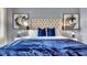 Spacious bedroom with plush bed and en-suite bathroom access at 2952 Waterlily Way, Poinciana, FL 34759