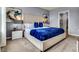 Bright bedroom featuring a king-size bed and ample natural light at 2952 Waterlily Way, Poinciana, FL 34759