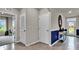 Bright entryway with tile flooring and coat closet at 2952 Waterlily Way, Poinciana, FL 34759