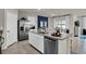 Kitchen with stainless steel appliances and granite countertops at 2952 Waterlily Way, Poinciana, FL 34759