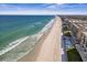 Aerial view of beachfront property with ocean and building details at 4575 S Atlantic Ave # 6209, Ponce Inlet, FL 32127