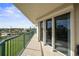 Covered balcony with access to sliding glass doors and ocean view at 4575 S Atlantic Ave # 6209, Ponce Inlet, FL 32127