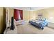 Bedroom with king-size bed and a twin-size daybed at 4575 S Atlantic Ave # 6209, Ponce Inlet, FL 32127