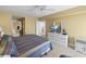 Spacious bedroom with king-size bed and dresser at 4575 S Atlantic Ave # 6209, Ponce Inlet, FL 32127
