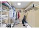 Walk-in closet with shelving and hanging rods at 4575 S Atlantic Ave # 6209, Ponce Inlet, FL 32127