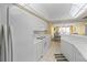 Kitchen with white cabinets, island, and ocean view at 4575 S Atlantic Ave # 6209, Ponce Inlet, FL 32127