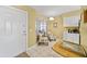Cozy kitchenette area with table and chairs, near entryway at 4575 S Atlantic Ave # 6209, Ponce Inlet, FL 32127