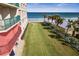 Ocean view from grassy area next to building at 4575 S Atlantic Ave # 6209, Ponce Inlet, FL 32127