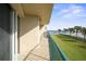 Balcony with partial ocean view and green space beyond at 4575 S Atlantic Ave # 6209, Ponce Inlet, FL 32127