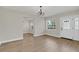 Dining room featuring hardwood floors and a chandelier at 610 Litchfield Way, Orlando, FL 32803