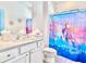 ' bathroom with a fun Frozen theme and modern fixtures at 6234 Sand Skipper Rd, Orlando, FL 32821