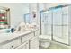 Clean, modern bathroom with a glass shower and white vanity at 6234 Sand Skipper Rd, Orlando, FL 32821