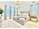 Elegant Primary bedroom with stylish furnishings and a large bed at 6234 Sand Skipper Rd, Orlando, FL 32821