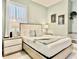 Inviting bedroom with soft green walls, comfortable bed, and matching nightstands at 6234 Sand Skipper Rd, Orlando, FL 32821