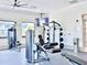 Well-equipped fitness center with weight machines at 6234 Sand Skipper Rd, Orlando, FL 32821