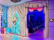 Star Wars themed home theater with neon lighting and reclining seats at 6234 Sand Skipper Rd, Orlando, FL 32821