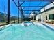 Relax in the inviting hot tub under a screened enclosure at 6234 Sand Skipper Rd, Orlando, FL 32821