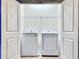 Well-equipped laundry room with modern washer and dryer units at 6234 Sand Skipper Rd, Orlando, FL 32821