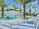 Resort-style pool with waterfall feature and lounge chairs at 6234 Sand Skipper Rd, Orlando, FL 32821