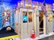 Themed room with superhero murals and gaming setup at 6234 Sand Skipper Rd, Orlando, FL 32821
