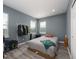 Well-lit bedroom with double bed and large windows at 762 Terrace Spring Dr, Orlando, FL 32828