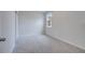 Bright bedroom with neutral walls and carpet at 8048 Scagel St, Orlando, FL 32832