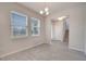 Simple dining area with hardwood floors and windows at 8048 Scagel St, Orlando, FL 32832