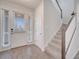 Bright entryway with front door and stairs at 8048 Scagel St, Orlando, FL 32832