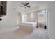 Main bedroom with large bed, ceiling fan, and windows at 8048 Scagel St, Orlando, FL 32832