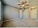 Spacious bedroom with ceiling fan and ample closet space at 831 Camargo Way # 203, Altamonte Springs, FL 32714