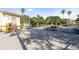 Gated community entrance with security booth and paved driveway at 831 Camargo Way # 203, Altamonte Springs, FL 32714