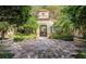 Community entrance with lush landscaping at 831 Camargo Way # 203, Altamonte Springs, FL 32714