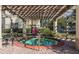 Community hot tub under a pergola at 831 Camargo Way # 203, Altamonte Springs, FL 32714