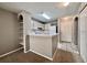 Galley kitchen with white appliances and ample cabinetry at 831 Camargo Way # 203, Altamonte Springs, FL 32714