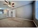 Bright living room featuring neutral walls and carpet at 831 Camargo Way # 203, Altamonte Springs, FL 32714