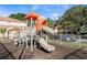 playground with slide and climbing structures at 831 Camargo Way # 203, Altamonte Springs, FL 32714