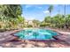 Community pool with plenty of lounge chairs at 831 Camargo Way # 203, Altamonte Springs, FL 32714