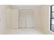 Bedroom with double door closet and window at 1073 Humphrey Blvd, Deltona, FL 32738